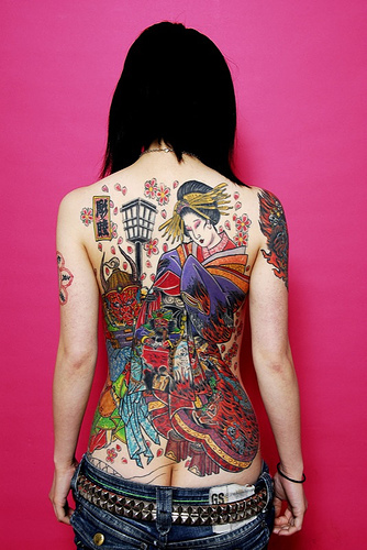 tattoo on back girl. outfit post: sailor stripes